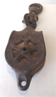 Metal pully with wooden wheel