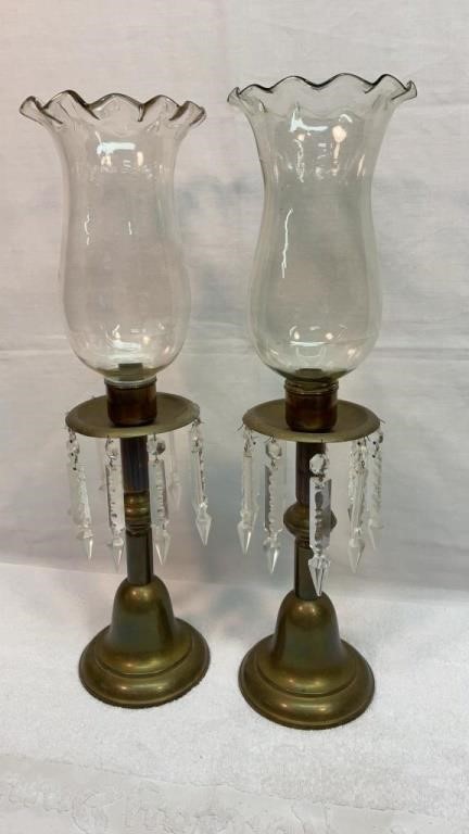 Brass candlesticks with glass prisms