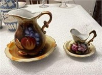 Two Small Porcelain Pitchers and Plates