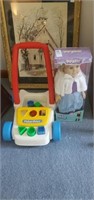 Springfield Doll and Fisher price push toy.