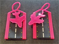 Two Airport Pink ID Tags