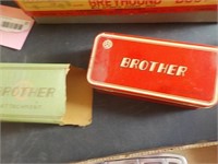 Vintage Brother oiler and sewing attachment