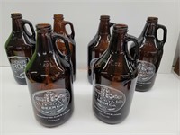 Six 1/2 gallon brown brewery jugs