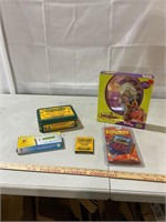 Assorted tins, frames, crayons, games