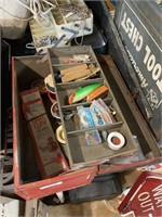 tackle box with assorted lures and line
