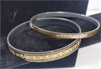 2 Black Metal Bangle Bracelets Floral Design