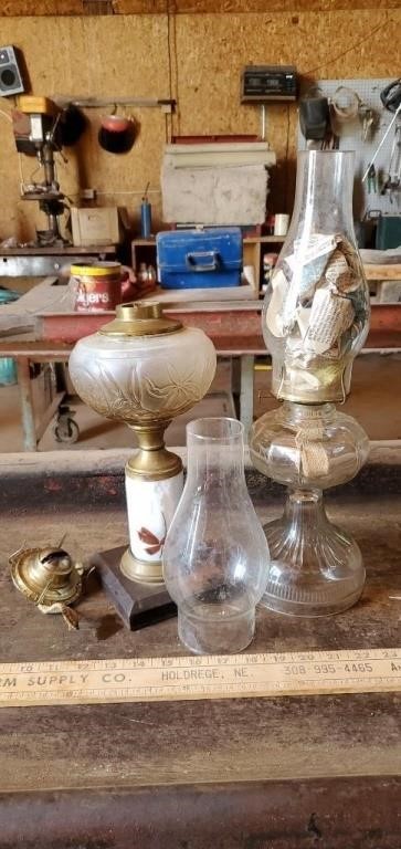 2 Antique Oil Lamps (1 has some damage).