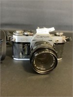 Canon AE-1 camera with lens battery door needs