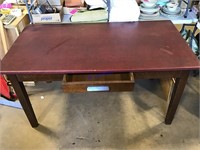 Red topped wood table 5 ft by 32 in