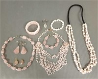 Group of rose quartz jewelry necklaces, earrings,