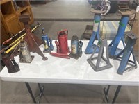 Assortment of bottle jacks and jack stands