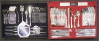 Two sets of stainless steel cutlery