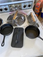 Bacon presses and two small cast-iron pans