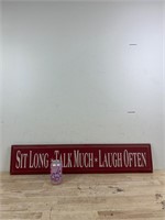 Sit long, talk much, laugh often wood sign