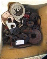 Pallet of parts including gears, driveshaft
