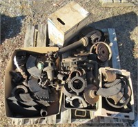 Pallet of parts including gears, driveshaft