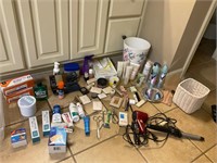 Makeup, scissors, dryer, bathroom assortment