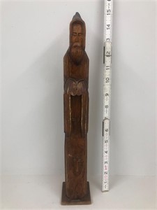 Carved wooden priest