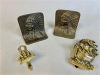 CAST IRON BOOKENDS AND BRASS DOOR KNOCKERS