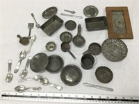 Lot of small tins, spoons and other