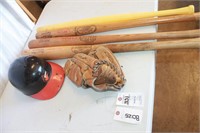 Baseball bats, glove and helmet