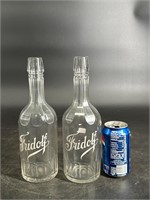 LOT OF 2 FRIDOLF WHISKEY BAR BACK ENAMEL BOTTLES