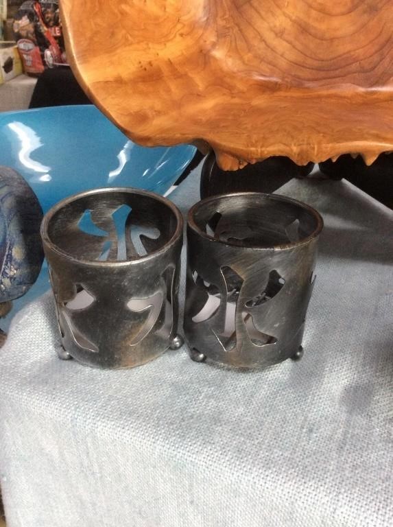 Pair of metal candleholders