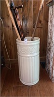 Vintage ceramic umbrella stand with wooden canes