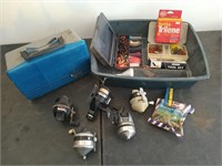 Plastic tub of assorted fishing, five reels,