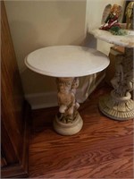 Marble top with cherub base