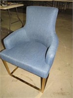 MID CENTURY STYLE PADDED BRASS BASE CHAIR