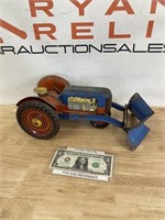 Vintage pressed tin Marx tractor with removable
