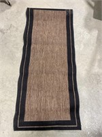 Rug 56” x 23”