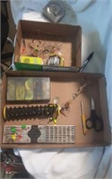 Box of Assorted hooks, fishing line, and more