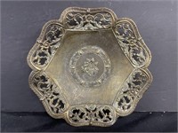 Ornate vintage brass dish. Approx. 7.5” diameter.