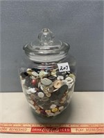 FAIR SIZED LOT OF BUTTONS IN GLASS COVERED JAR