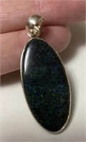 E2) silver and gemstone pendant - believe it is