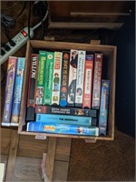 Assortment of 15 VHS movies with wooden storage