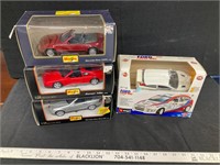 4 die cast cars