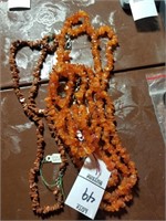 Lot of 2 amber necklaces with bracelet and 1 sun