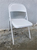 White metal folding chairs