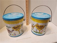 2 Sheds Peanut Butter tins.