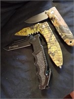 Three very nice heavy duty pocket knives one is