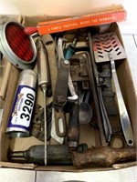 Box of Antique hand tools, rug making tool, and