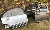 Lot with Many Various Car Doors