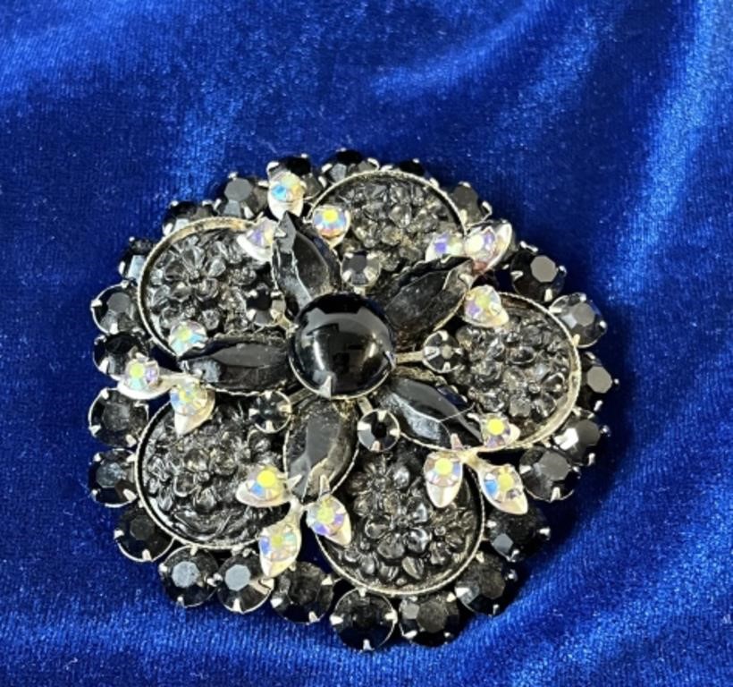 Vintage black glass brooch