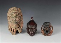 Three Small Carved Wooden Masks