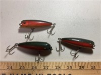 3 fishing lures ( possibly wood)