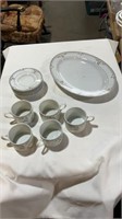 Teacups saucers platter