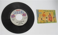 Black Americana post card and 45 Rebel record.